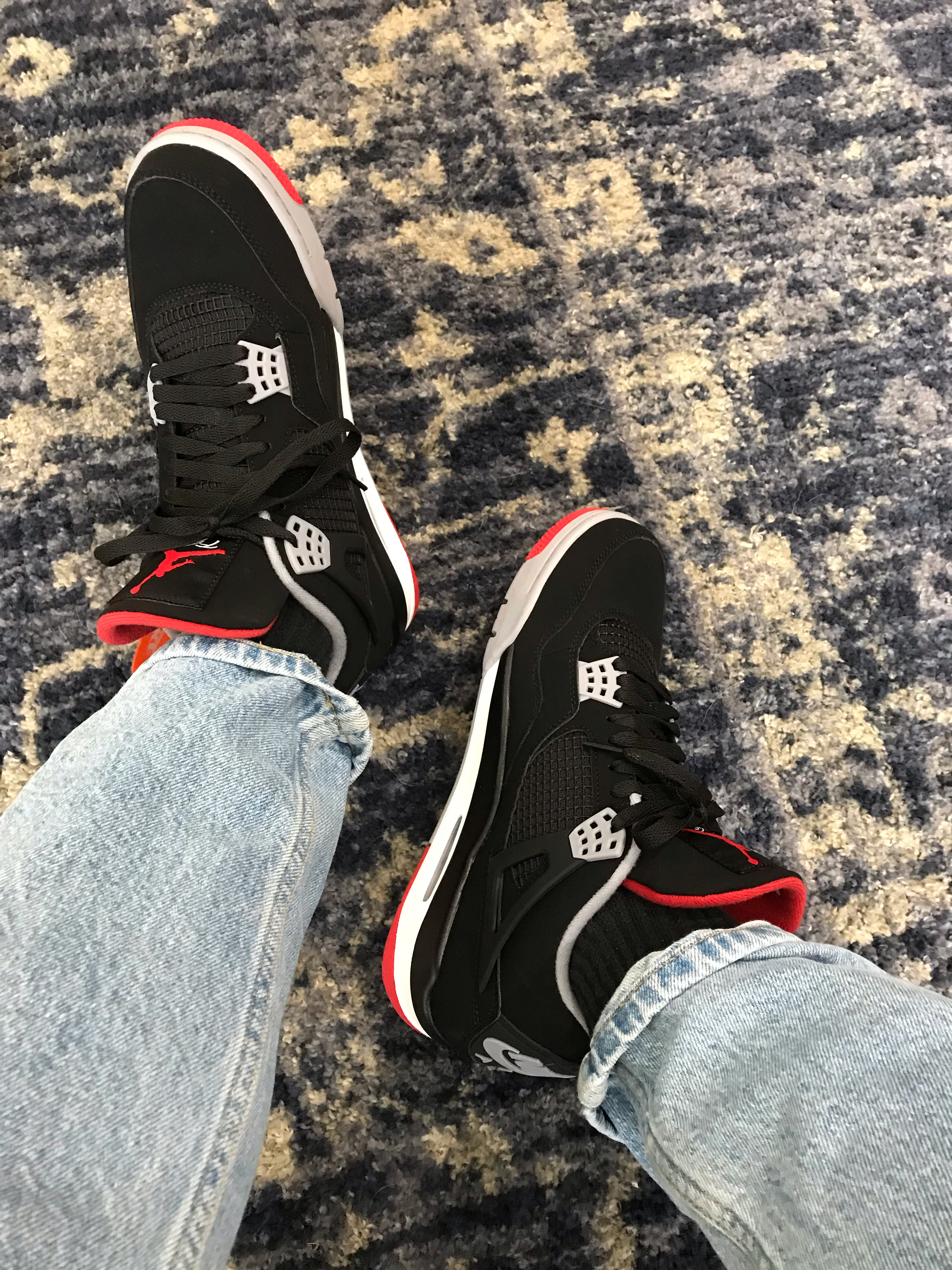 jordan 4 bred with jeans